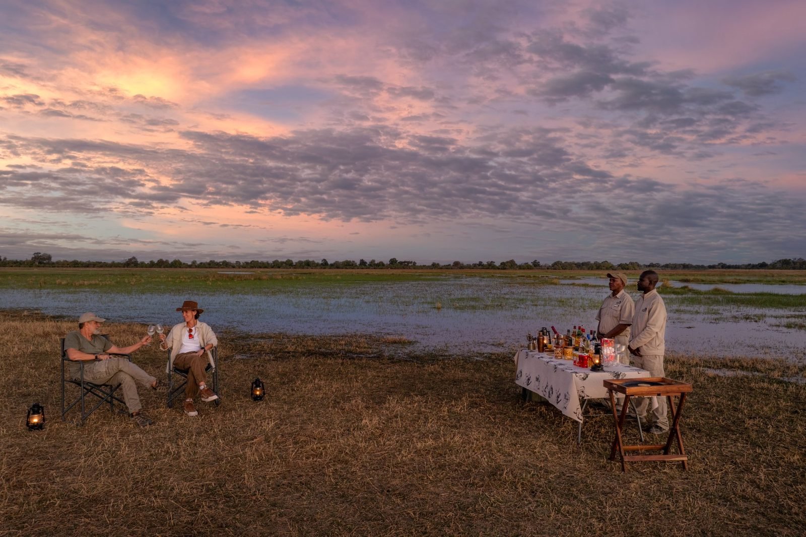 Sundowner on the floodplains — Okavango Delta